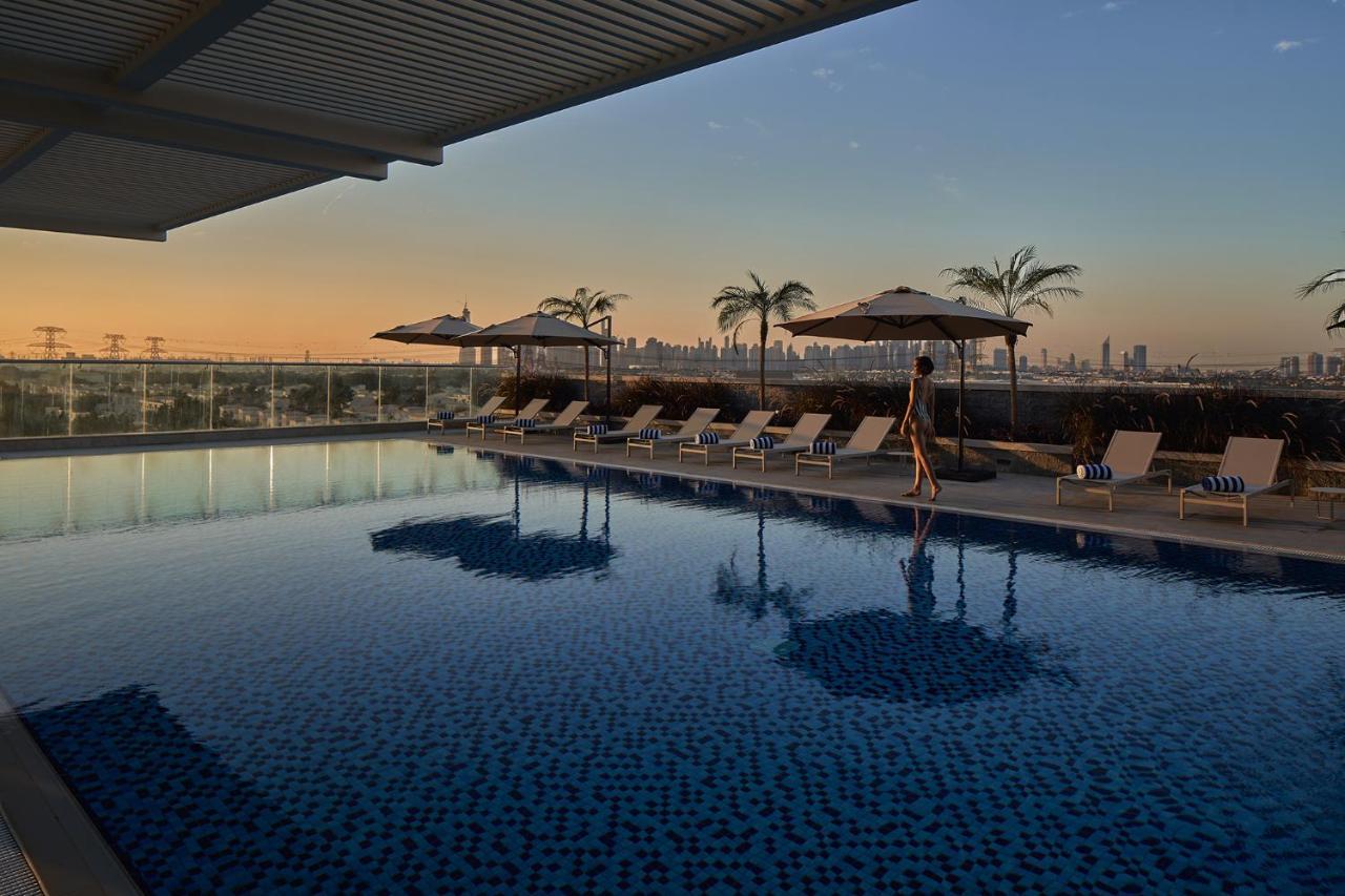 Movenpick Jumeirah Village Triangle 두바이 외부 사진 The rooftop pool at the hotel