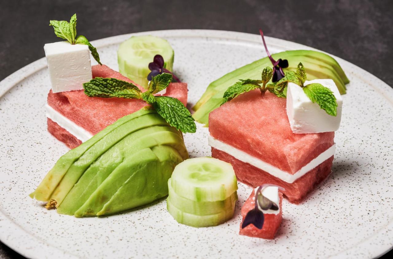 Movenpick Jumeirah Village Triangle 두바이 외부 사진 Watermelon and avocado salad