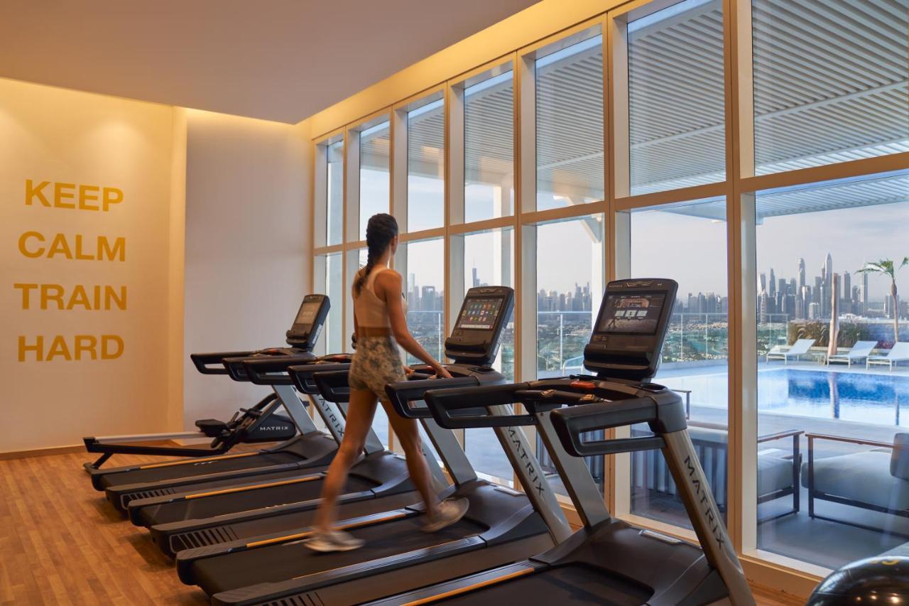 Movenpick Jumeirah Village Triangle 두바이 외부 사진 The gym at the hotel